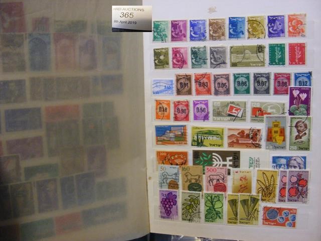 Album containing a large collection of stamps and