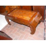 A Chinese hardwood low table with insect carved pa