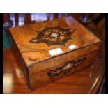 A Victorian walnut needlework box with vintage con