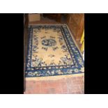 Oriental style rug with blue border - 200cm x 138c