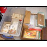 Two boxes containing collectable cigarette cards,