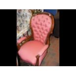 Antique style armchair with button backrest