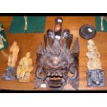 Carved soapstone oriental figures, together with a