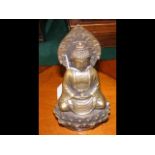A 14cm high bronze Buddha with signature to base