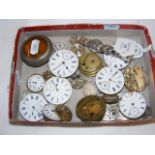 A box of pocket watch movements and other