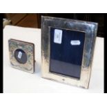 Silver and enamel photo frame and one other