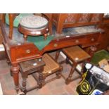 Antique desk with three drawers to the front