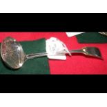 WITHDRAWN - Silver sifter spoon