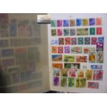 Album containing a large collection of stamps and