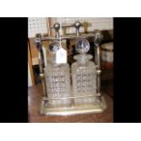 A two bottled silver plated tantalus