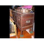 A small proportioned period oak coffer with carved