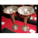 A pair of 18cm high silver vases - 15oz
