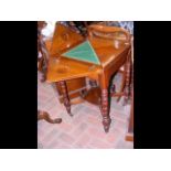 A late Victorian envelope games table with single