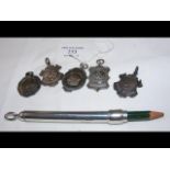 Five silver pocket watch chain fobs and a Sampson