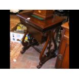 A William IV rosewood worktable on lyre supports