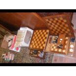 A wooden chess set, together with a large collecti