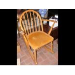 A small Ercol child's rocking chair