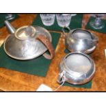 A Liberty three-piece pewter teaset