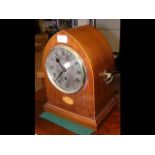 A 31cm high lancet shaped mantel clock