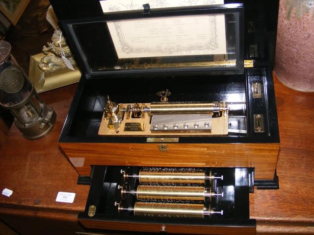 A Victorian style Swiss music box, having five int