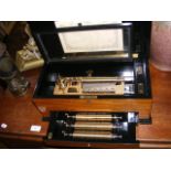 A Victorian style Swiss music box, having five int