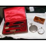 A silver pocket watch, manicure set, etc.