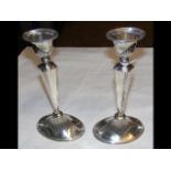 A pair of antique silver candlesticks - 23cm high