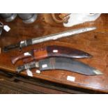 Old kukri with leather scabbard, together with bay