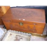A carved camphorwood chest - 104cm