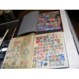 Two albums containing GB and world stamps