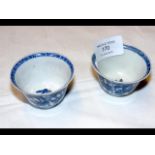 A pair of Kangxi wine cups with foliate decoration