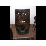 A large carved wooden African mask - 92cm x 42cm