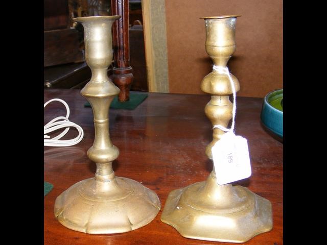 Two 18th century candlesticks - 18cm high