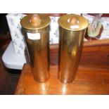 A pair of 28cm high trench art shell cases with en