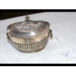 A silver tea caddy with London hallmark - 10cm hig