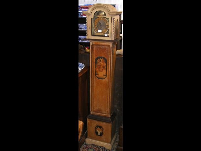 An oak cased Grandmother clock