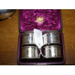 A Victorian cased set of four plated napkin rings