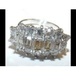 An 18ct white gold diamond cluster ring - approx.