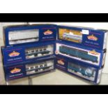 Six boxed Bachmann carriages, etc.