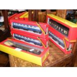 Five boxed Hornby coaches