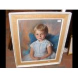 A pastel drawing of child in chair - signed lower