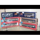Four boxed Lima and two boxed Bachmann carriages