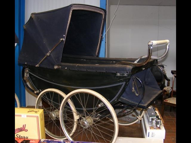 A vintage Silver Cross pram in blue