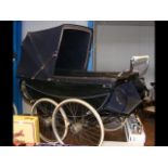 A vintage Silver Cross pram in blue