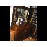 A mirrored back sideboard