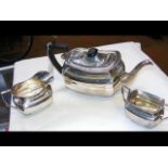 A three piece silver teaset with London hallmark