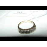 A multi diamond ring in 9ct gold setting