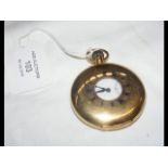 An 18ct gold half hunter pocket watch with separat