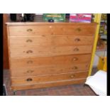 A large antique pine plan chest, having six drawer