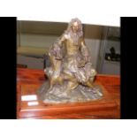 A bronze antique figure of seated man - 20cm high